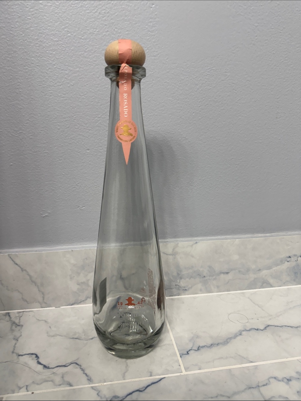 Decorative Clear Glass Bottle with Peach Accent